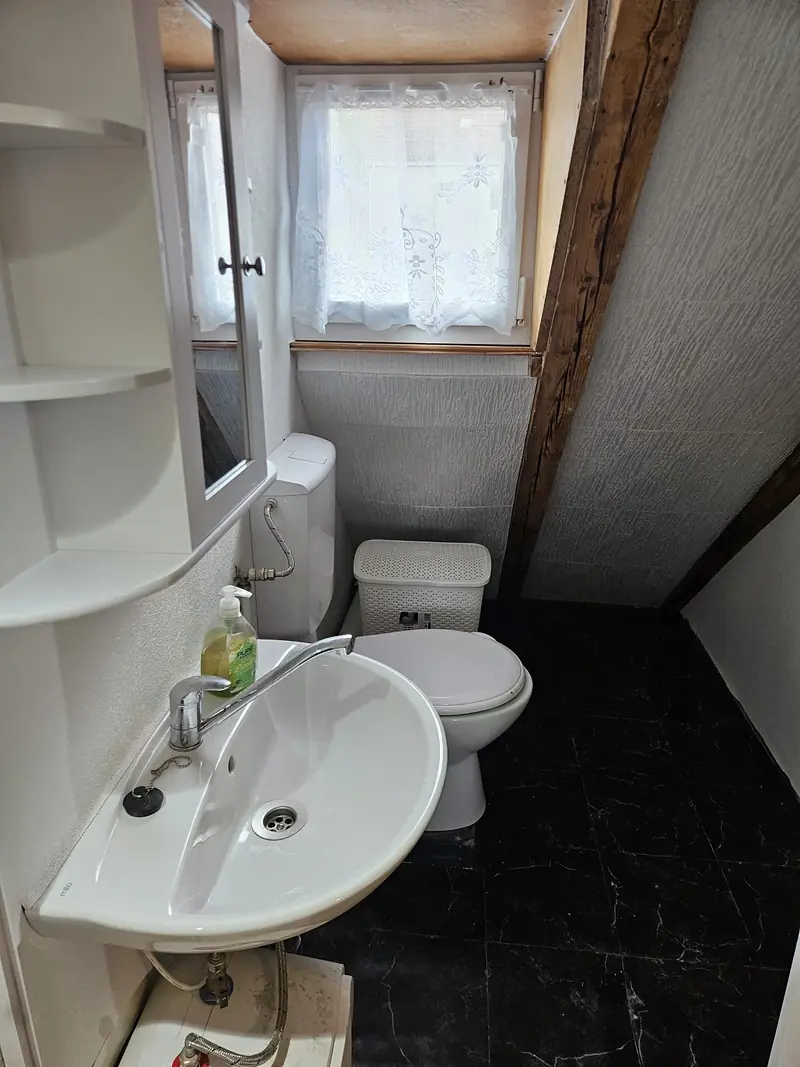 Private bathroom with a window