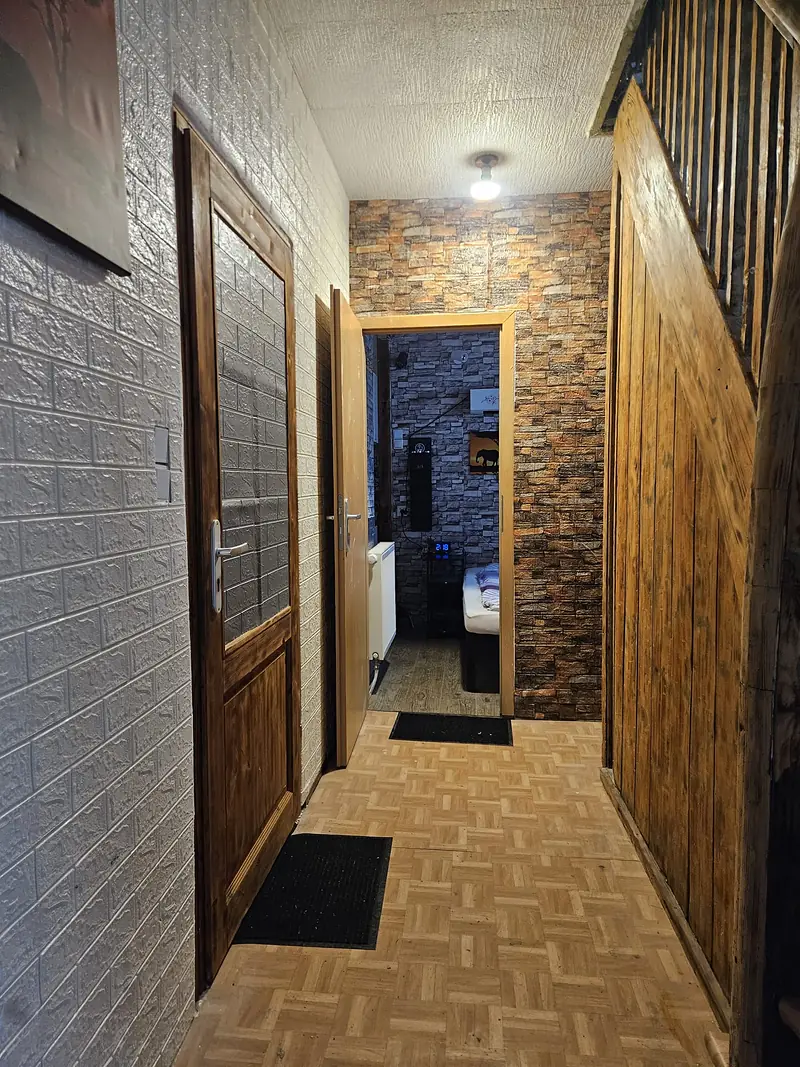Hallway with wooden stairs