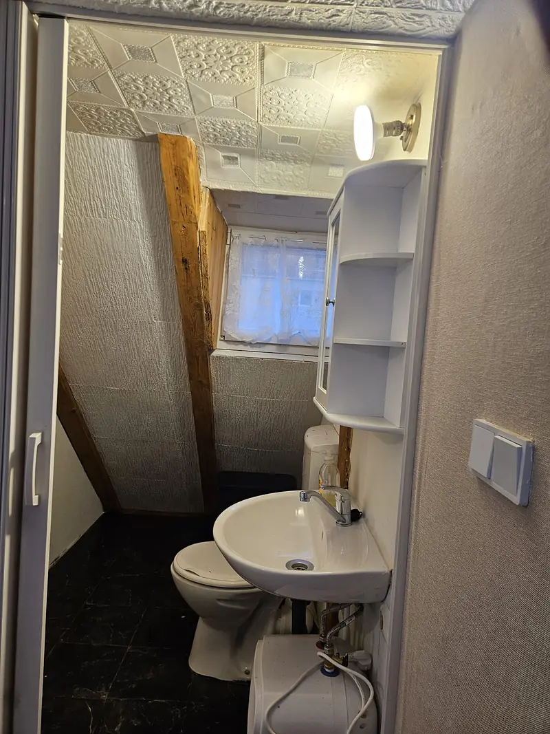 Private bathroom with a window