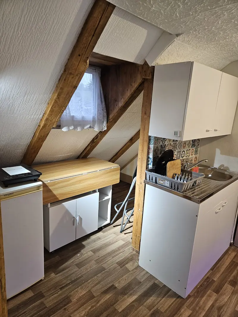 Kitchenette with folding table and window