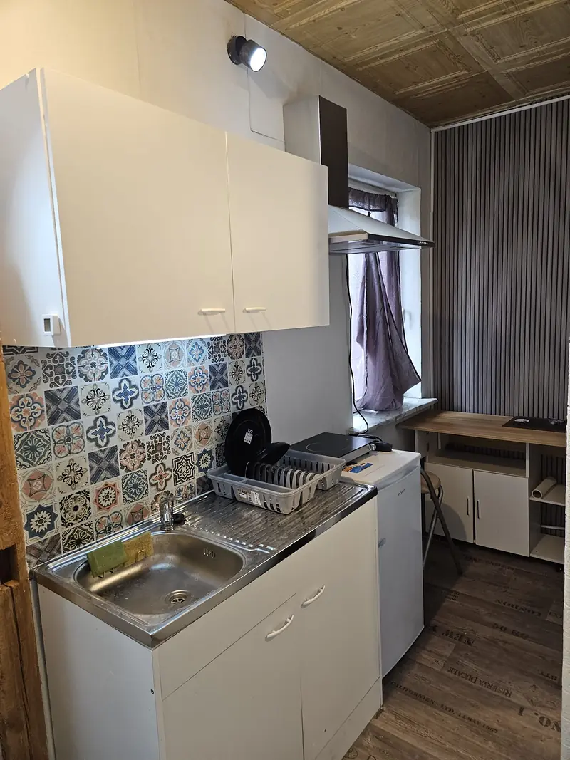 Kitchenette and folding table by the window
