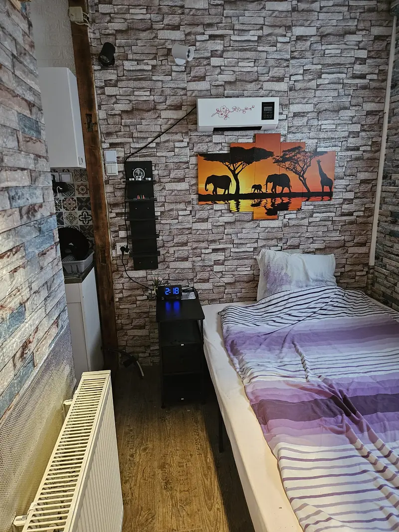 Bed with bedside table