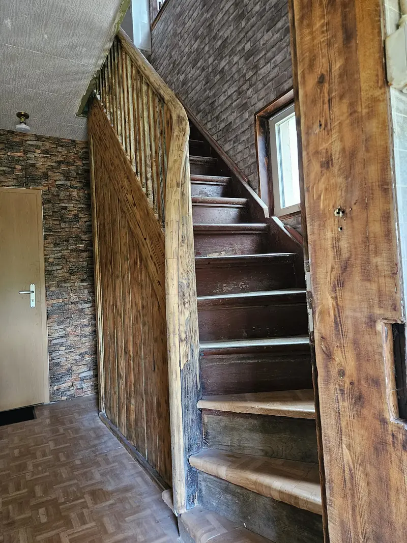 Wooden stairs to the attic floor